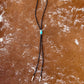 Royal Blue Royston Turquoise bolo tie with dark brown leather cord and sterling silver tips