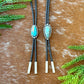 Blue Moon Turquoise bolo tie with dark brown leather cord and sterling silver tips