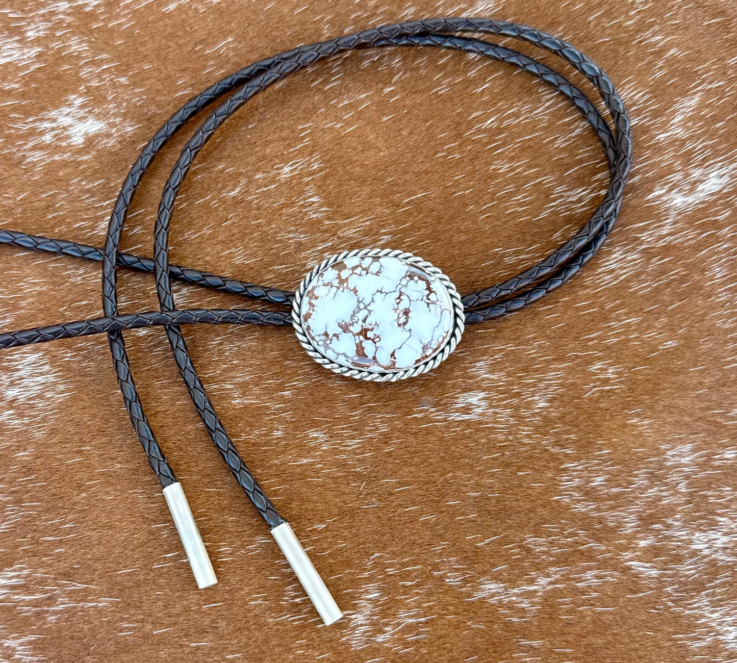 Wild Horse Magnesite Bolo Tie with dark brown leather cord and sterling silver tips
