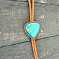 Kingman Golden Web Turquoise Bolo Tie with Golden Leather Cord