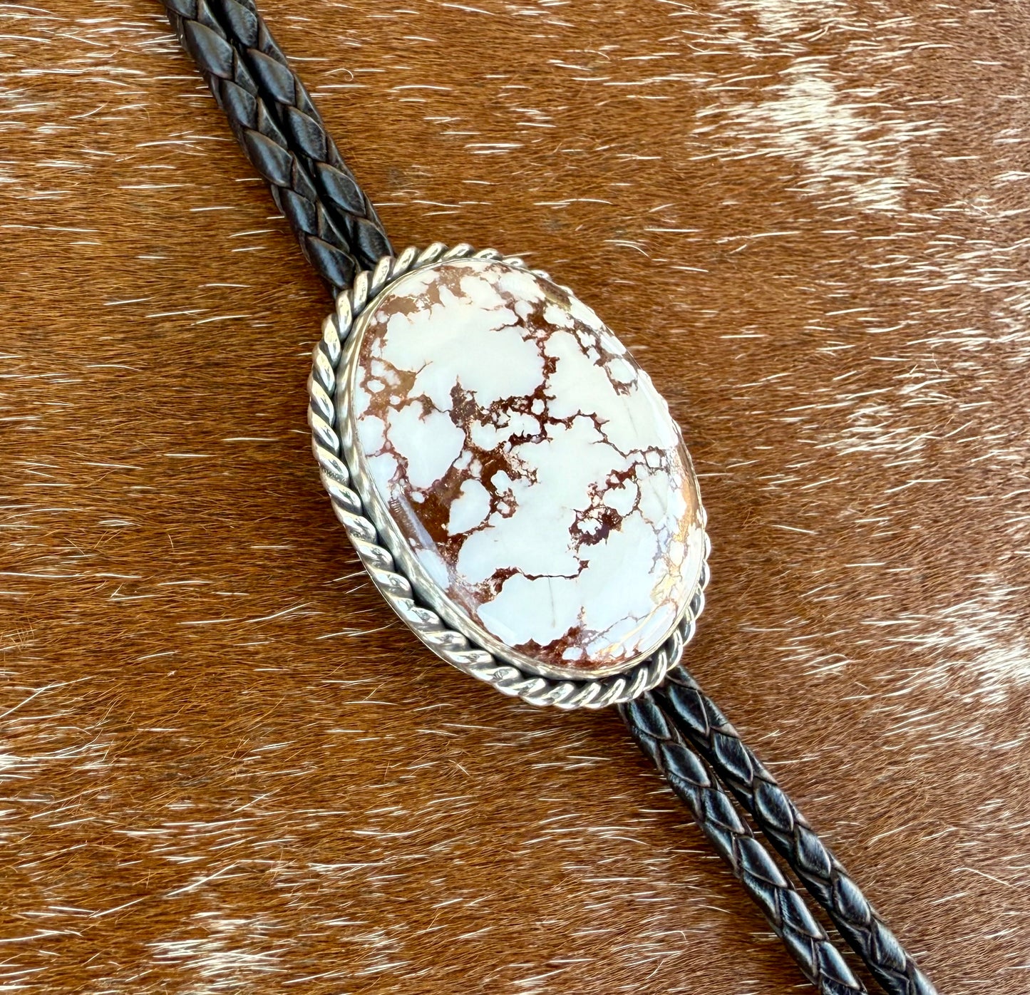 Wild Horse Magnesite Bolo Tie with dark brown leather cord and sterling silver tips