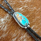 Royal Blue Royston Turquoise bolo tie with dark brown leather cord and sterling silver tips