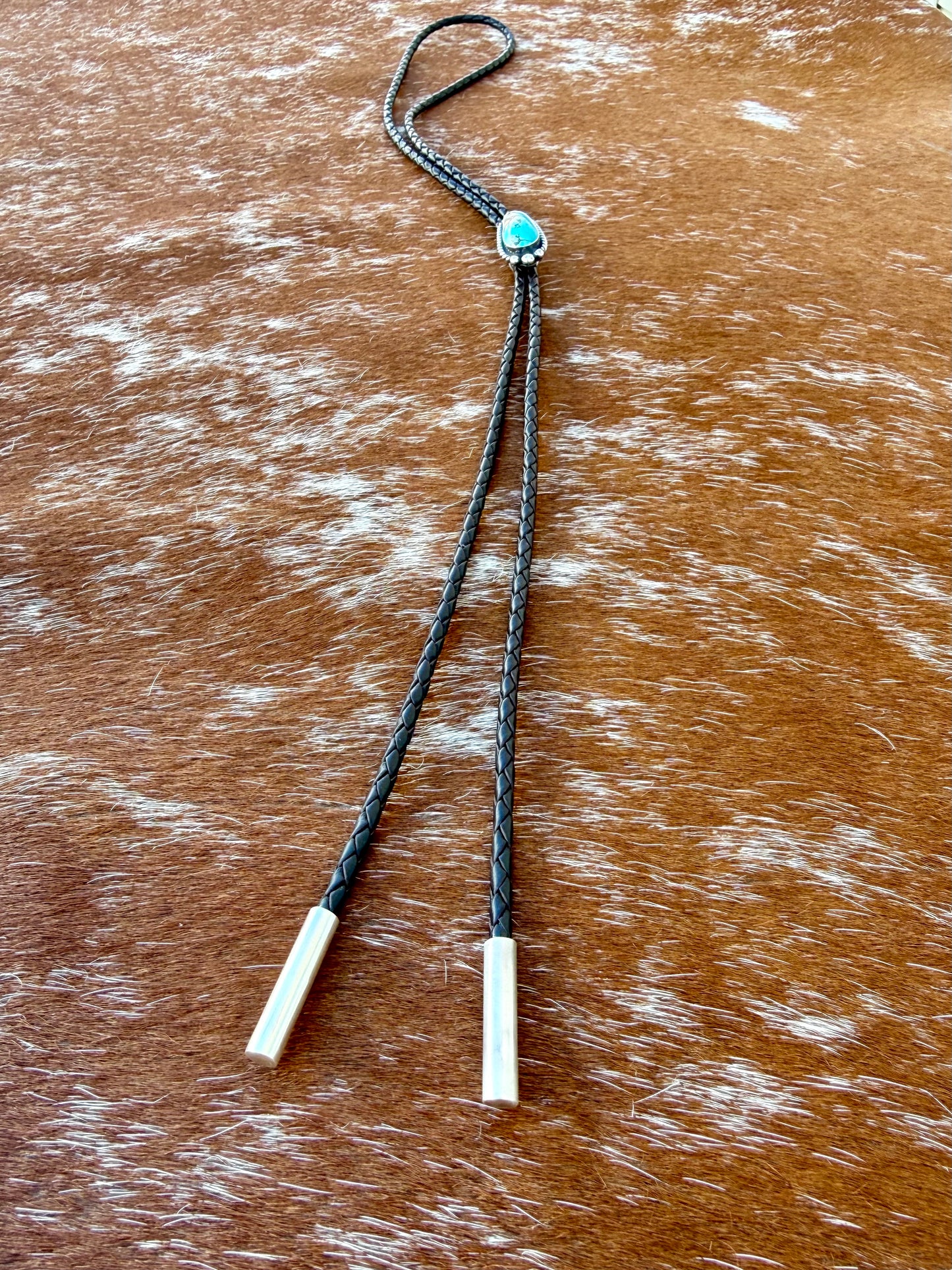 Royal Blue Royston Turquoise bolo tie with dark brown leather cord and sterling silver tips