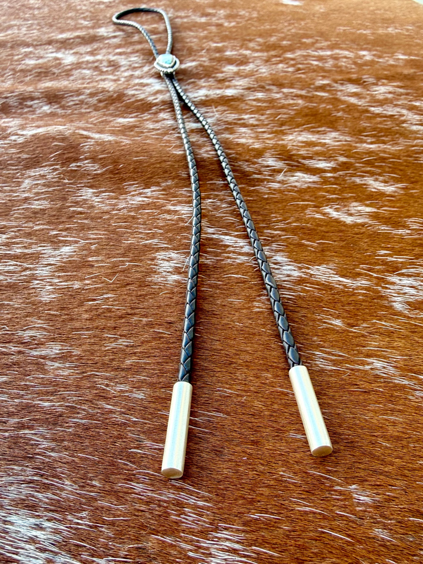 Blue Moon Turquoise bolo tie with dark brown leather cord and sterling silver tips